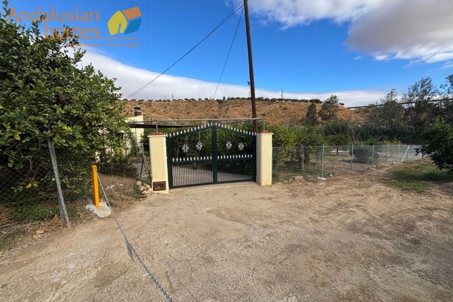 chalet for sale Álora, Las Mellizas property, country house Málaga, rural home for sale, finca Álora, house with pool Álora, property with well water, fruit trees property, peaceful rural retreat, fenced plot Álora, Andalusian countryside home, ready to move in chalet, Málaga real estate