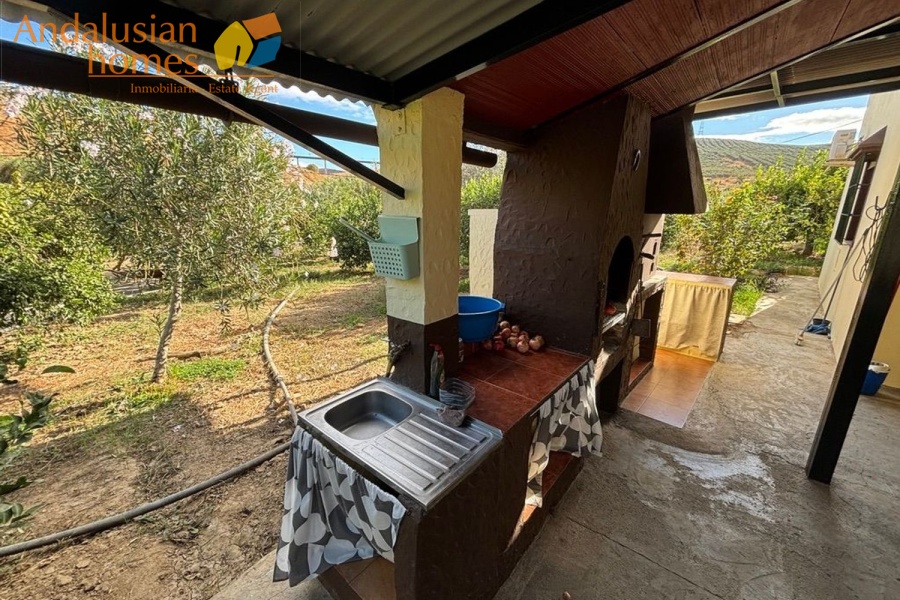 chalet for sale Álora, Las Mellizas property, country house Málaga, rural home for sale, finca Álora, house with pool Álora, property with well water, fruit trees property, peaceful rural retreat, fenced plot Álora, Andalusian countryside home, ready to move in chalet, Málaga real estate