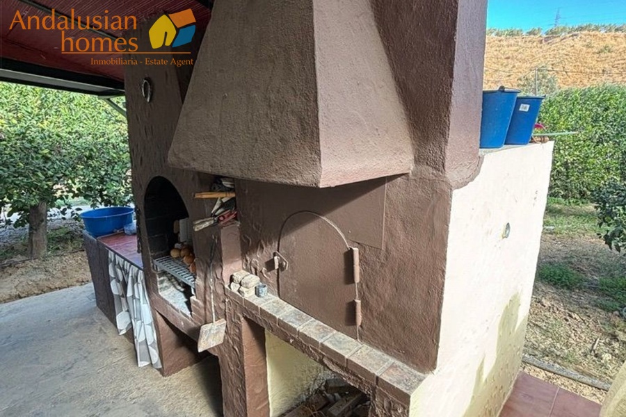 chalet for sale Álora, Las Mellizas property, country house Málaga, rural home for sale, finca Álora, house with pool Álora, property with well water, fruit trees property, peaceful rural retreat, fenced plot Álora, Andalusian countryside home, ready to move in chalet, Málaga real estate