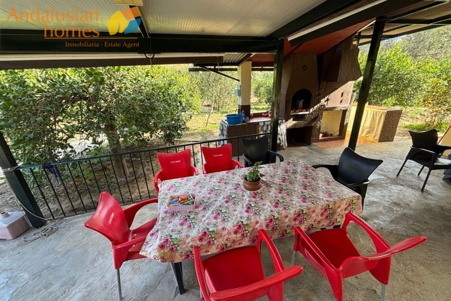 chalet for sale Álora, Las Mellizas property, country house Málaga, rural home for sale, finca Álora, house with pool Álora, property with well water, fruit trees property, peaceful rural retreat, fenced plot Álora, Andalusian countryside home, ready to move in chalet, Málaga real estate
