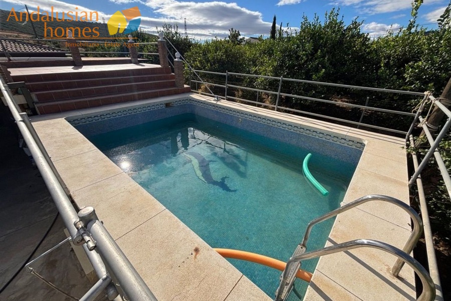 chalet for sale Álora, Las Mellizas property, country house Málaga, rural home for sale, finca Álora, house with pool Álora, property with well water, fruit trees property, peaceful rural retreat, fenced plot Álora, Andalusian countryside home, ready to move in chalet, Málaga real estate