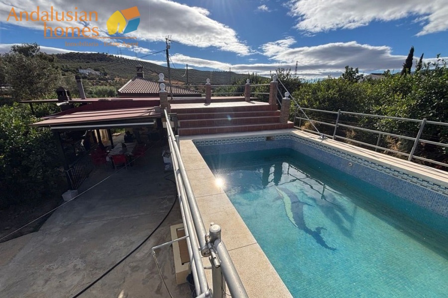 chalet for sale Álora, Las Mellizas property, country house Málaga, rural home for sale, finca Álora, house with pool Álora, property with well water, fruit trees property, peaceful rural retreat, fenced plot Álora, Andalusian countryside home, ready to move in chalet, Málaga real estate