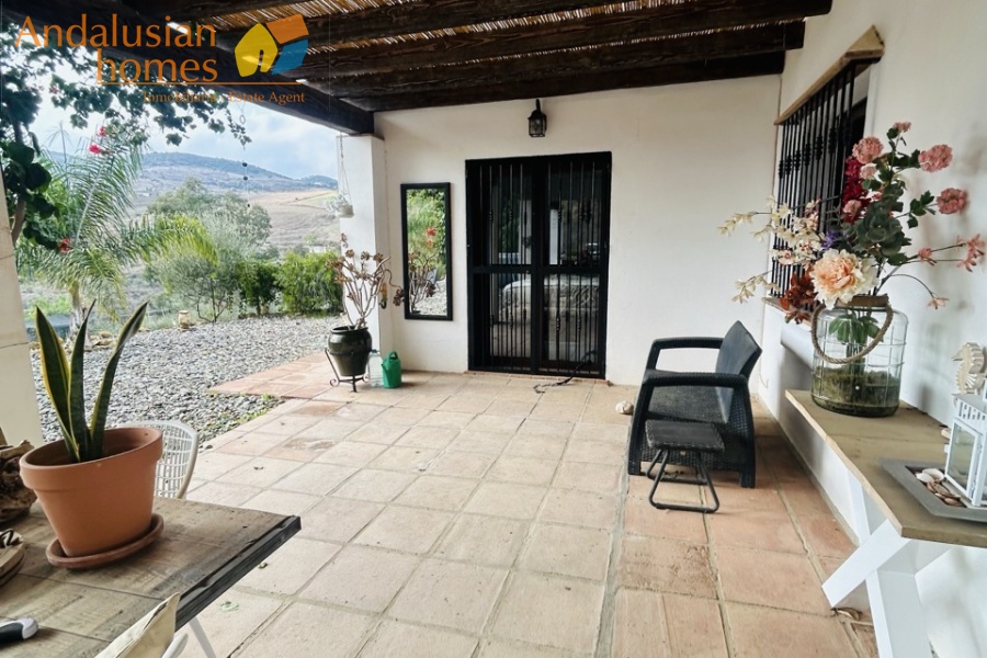 country home for sale, rural property, finca for sale, country house with pool, 3 bedroom country home, property with land, large plot 34000m2, Spain country property (or your region), countryside retreat, home with terrace, bamboo terrace, property with water deposits, peaceful rural living, country house with fireplace, L-shaped living room, master bedroom ensuite, pool and BBQ area, storage and covered parking