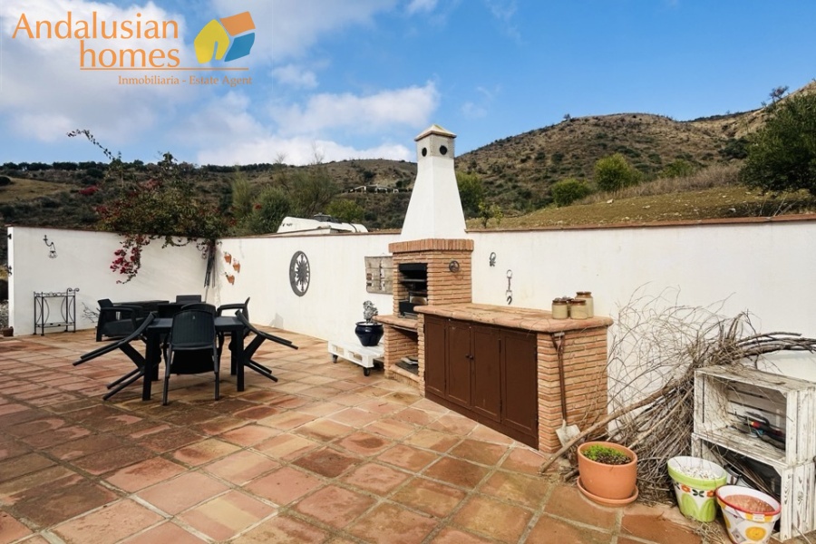 country home for sale, rural property, finca for sale, country house with pool, 3 bedroom country home, property with land, large plot 34000m2, Spain country property (or your region), countryside retreat, home with terrace, bamboo terrace, property with water deposits, peaceful rural living, country house with fireplace, L-shaped living room, master bedroom ensuite, pool and BBQ area, storage and covered parking