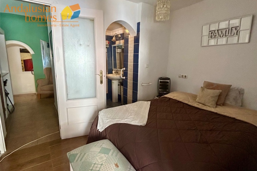 Main bedroom with ensuite and storage 