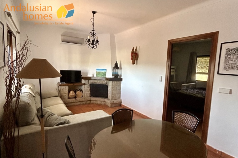 Country home, Álora, Las Mellizas, Málaga countryside, detached villa, olive grove, 4000m2 plot, private pool, panoramic views, terraces, fenced plot, parking, fireplace, ensuite bedroom, outdoor living, rural retreat, train access, investment property, holiday rental, tourism potential, Andalusian property, peaceful location, close to El Chorro, near Málaga coast